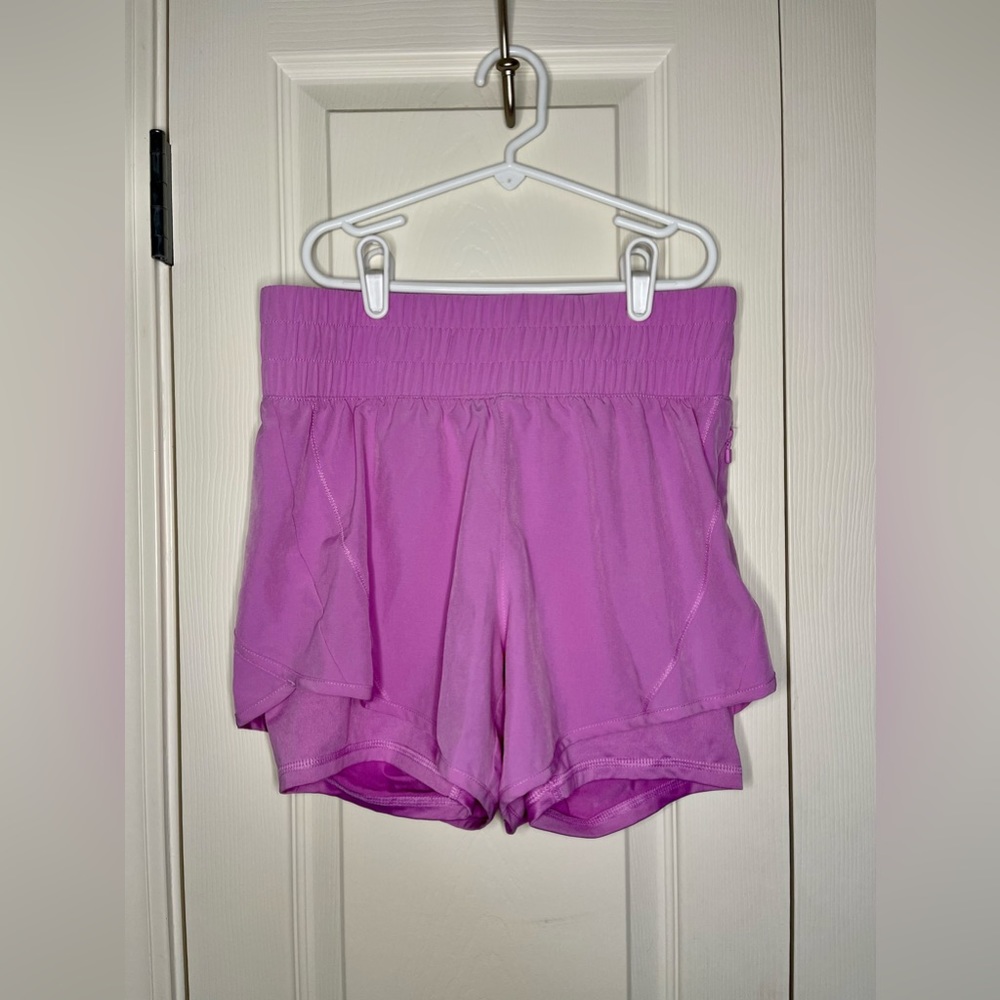 Pink workout shorts with built in spandex